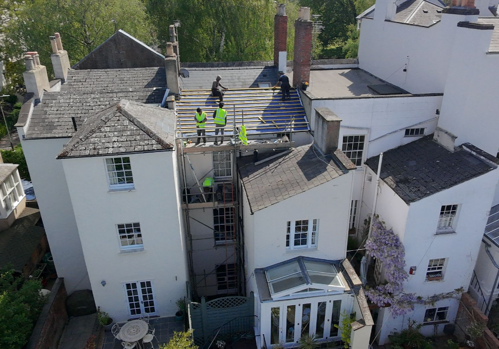 Back Section Roof Replacement in Cheltenham Townhouse After Bedroom Leak