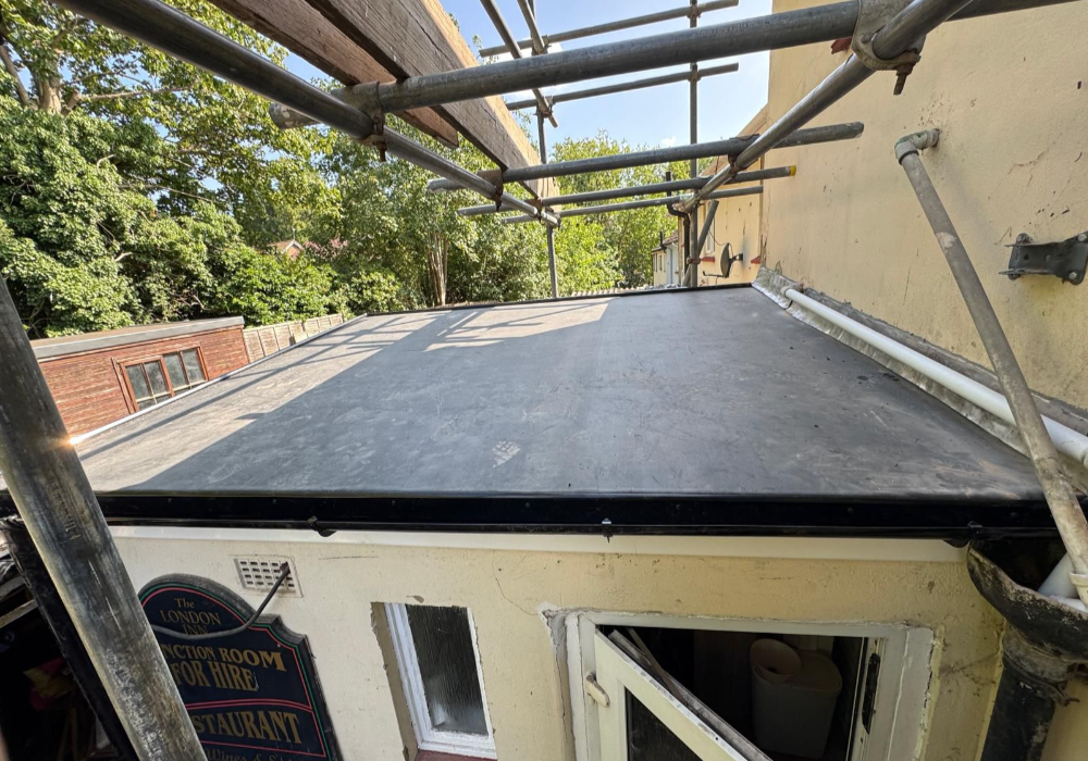 Corrugated Roof Renewal and EPDM System Installation at Cheltenham Property