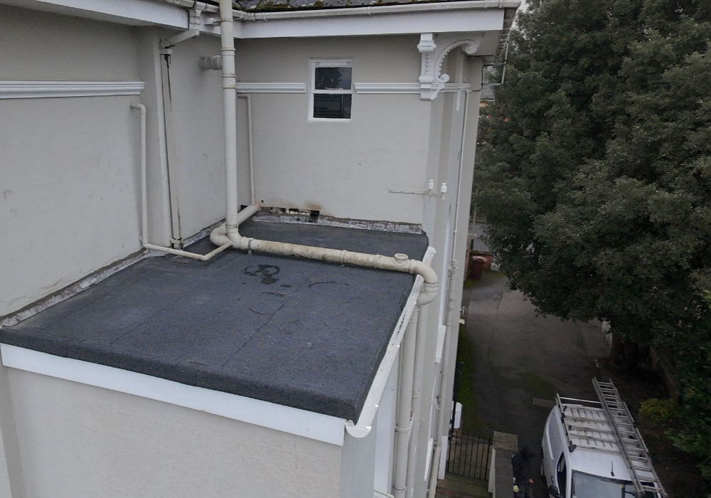 Flat Roof Leak Causing Internal Damp Before Roof Replacement