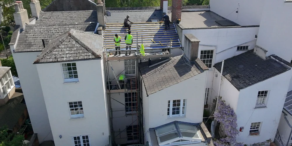 Back Section Roof Replacement in Cheltenham Townhouse After Bedroom Leak